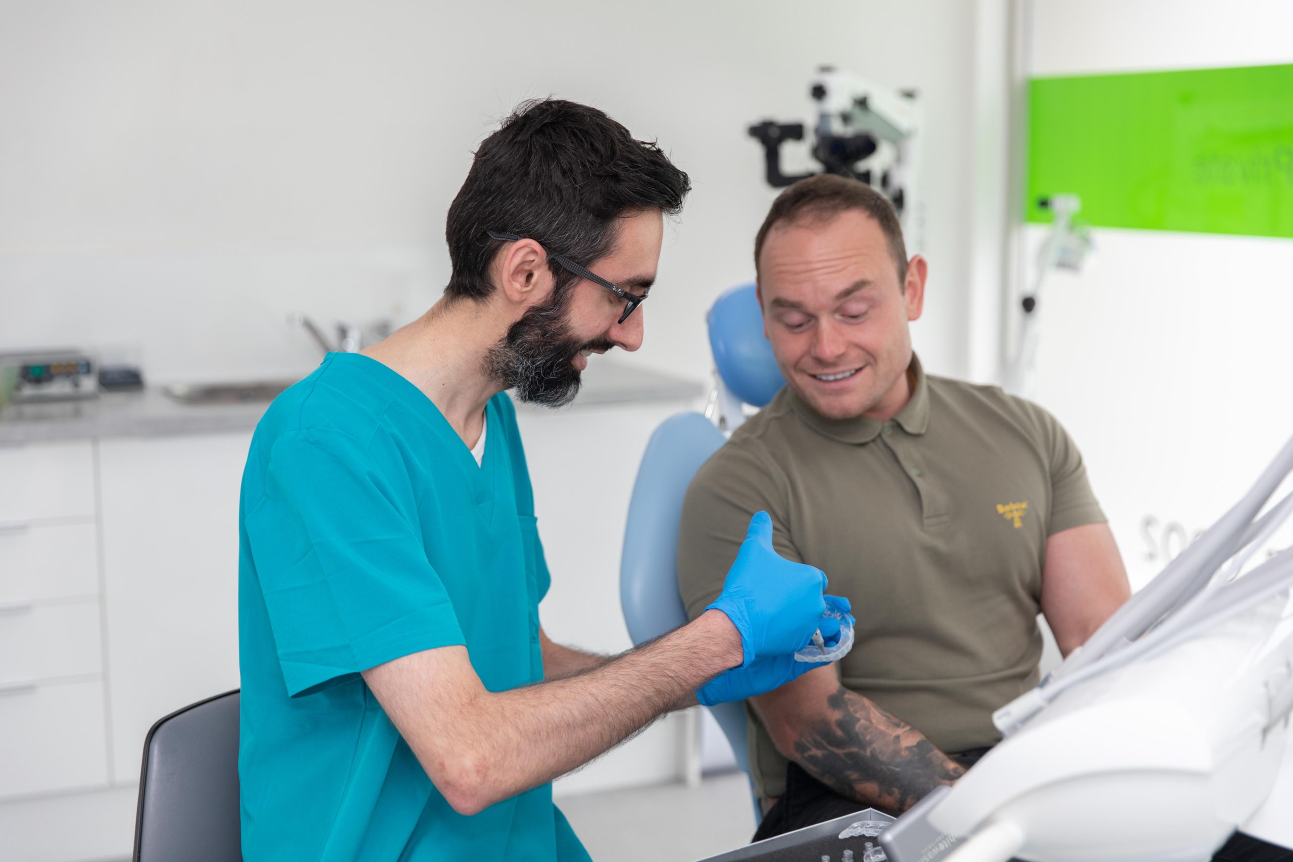 patients learning about teeth whitening in edinburgh